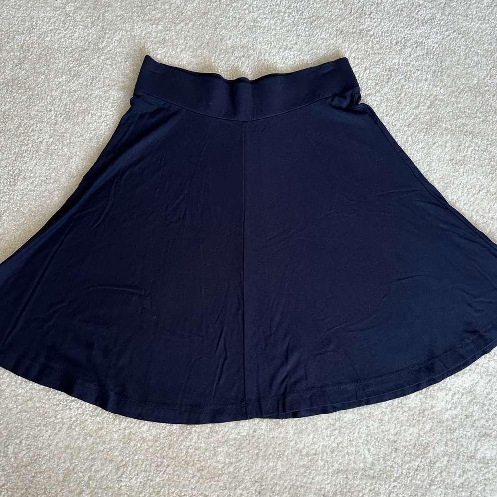 3 knee length skirts sold together or separately